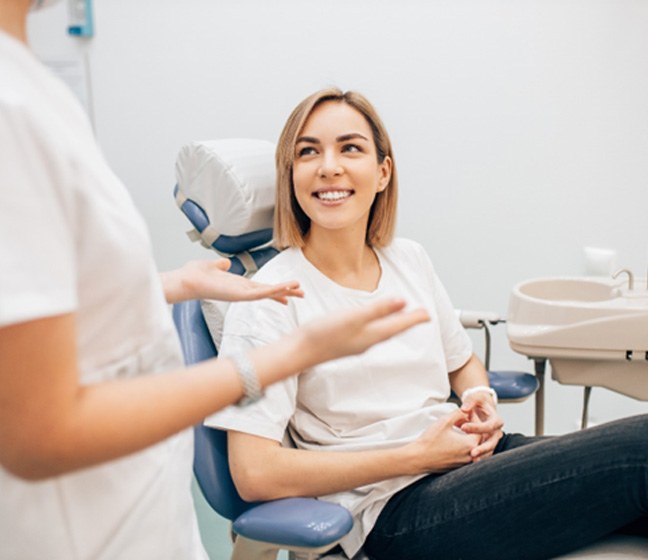 patient talking to dentist 