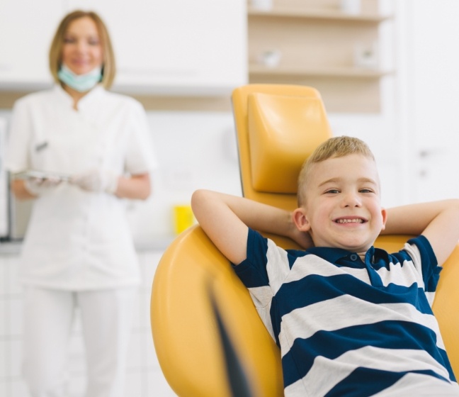 Child relaxing during dental visit with sedation dentistry for kids