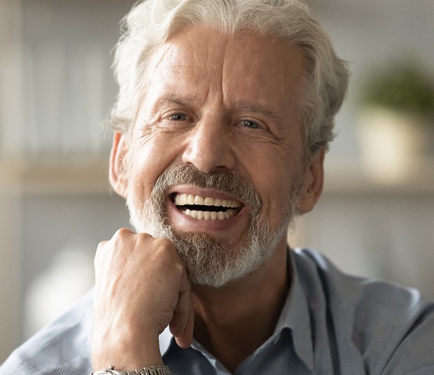 Senior man smiling with dentures