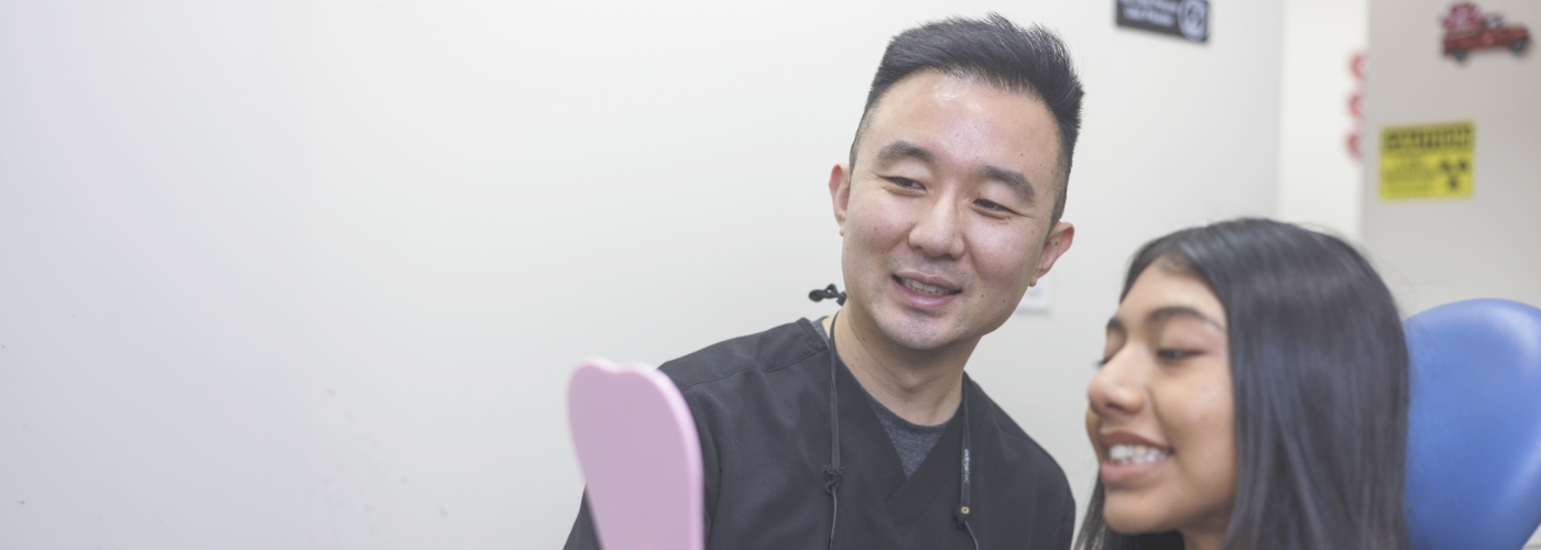 Woman smiling and holding her young son