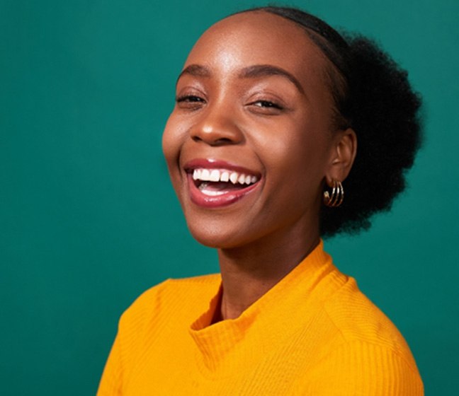 Woman showing off healthy smile  