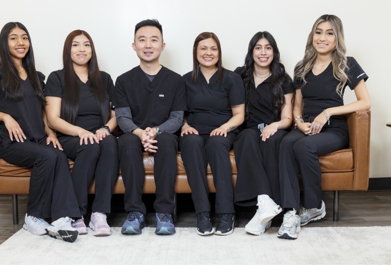 Dr. Henry Lu & his Dental Team smiling