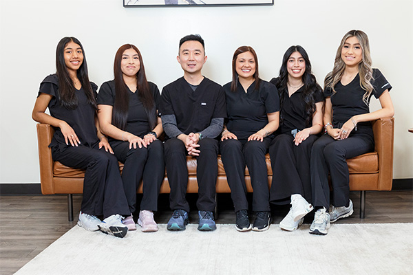 Dr. Henry Lu & his Dental Team smiling